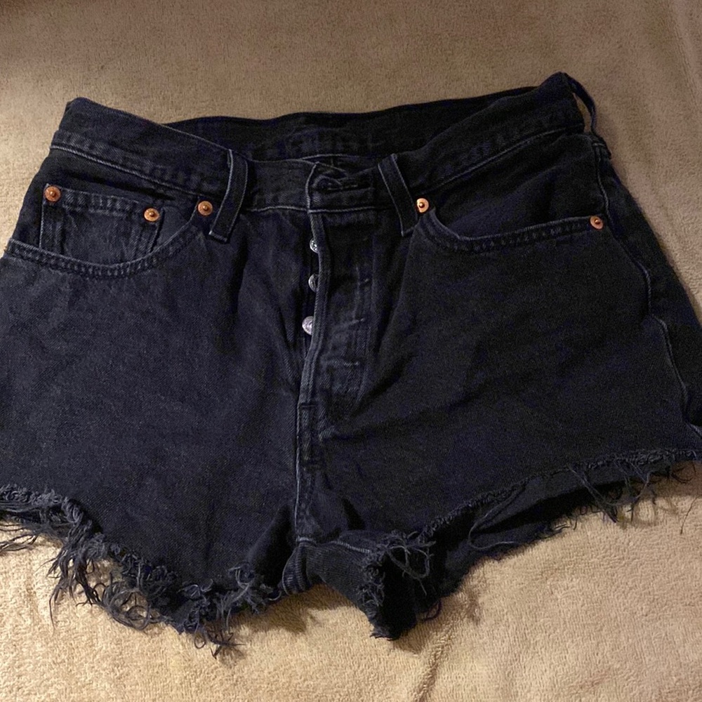 501 faded black color Levi Jean shorts